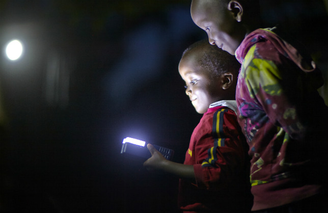 African Boys Solar Lamp