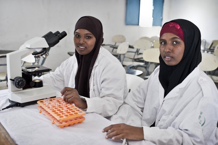 Young women study in a science laboratory