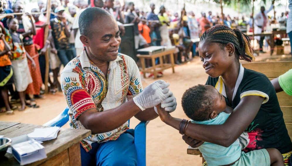 Health worker Bernadin Mokuba tests people for Human African Trypanosomiasis (HAT) during the inaugural National Day of HAT in Bangumi village, Democratic Republic of the Congo on February 1, 2018. The recognition day celebrated the DRC government's commitment to eliminating HAT by 2020 and outlined the upcoming national strategy for achieving this goal. The event also recognized the contributions of a consortium of international partners, including the Belgian Institute of Tropical Medicine Antwerp (ITM) and the Belgian Development Cooperation, the Bill &amp; Melinda Gates Foundation, the Drugs for Neglected Diseases Initiative (DNDi), Program for Appropriate Technology in Health (PATH) , Foundation for Innovative New Diagnostics (FIND), and the World Health Organization (WHO).