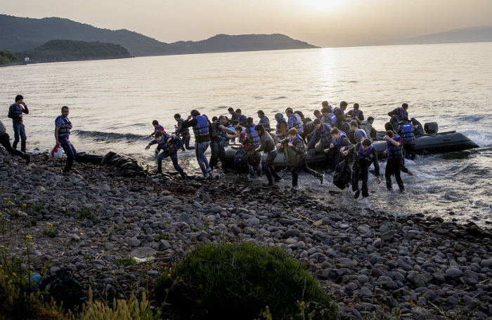 Refugees escape by boat.jpg