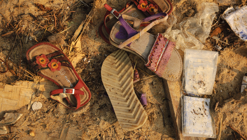 Tourists' shoes and a wallet litter the beach at Khao Lak, Thailand, following the December 26, 2004 tsunami 
