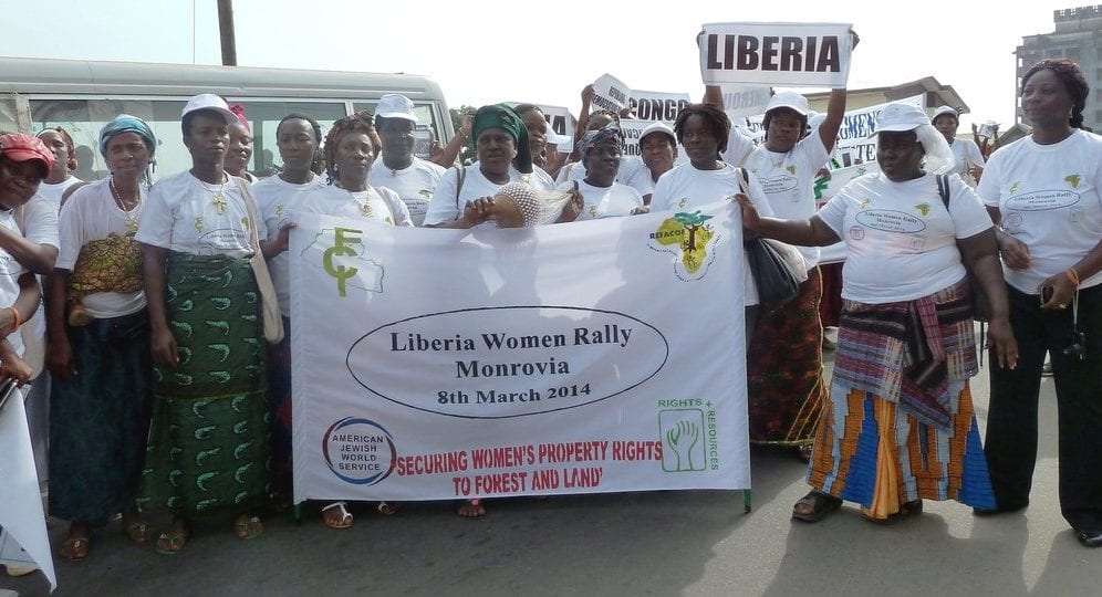rsz_participants_from_countries_across_africa_hold_up_a_banner_at_a_monrovia.jpg