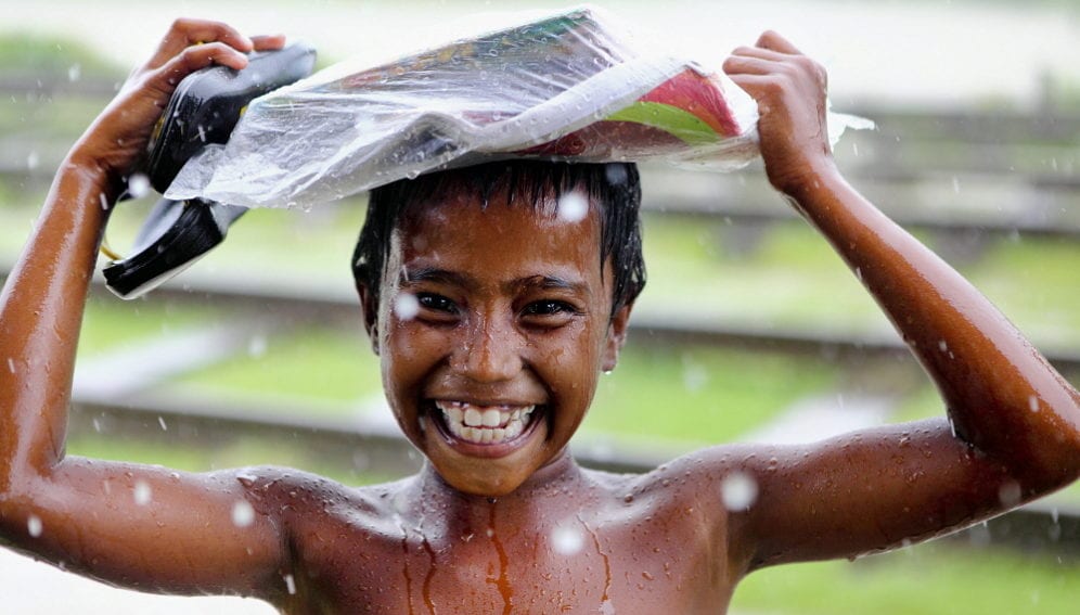 A_Bangla_boy_enjoying_rain_GMBAkash_panos