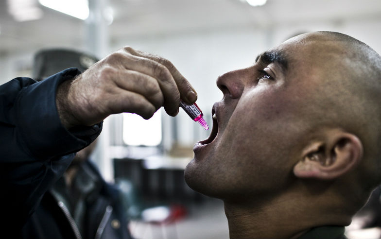 cadet gets an oral polio vaccine