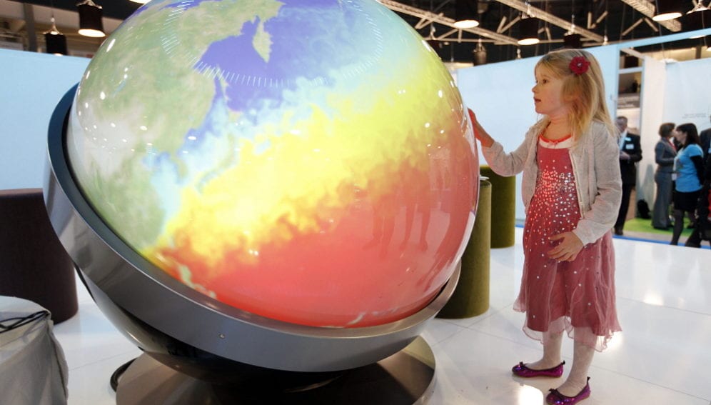 Climate change child with globe