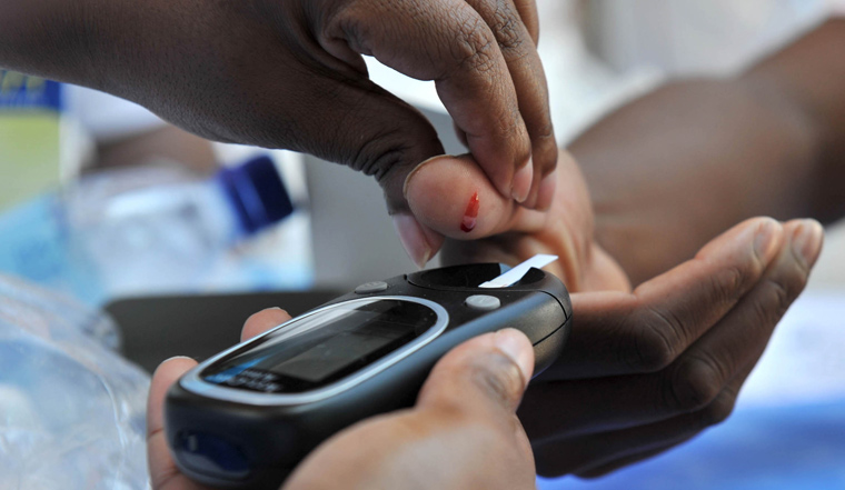 Community members get tested for sicknesses such as high blood pressure and diabetes