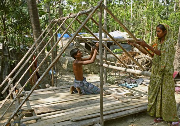 Couple building shelter