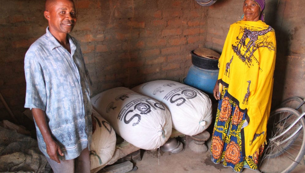 Farmers safely storing grains in hermetic bags