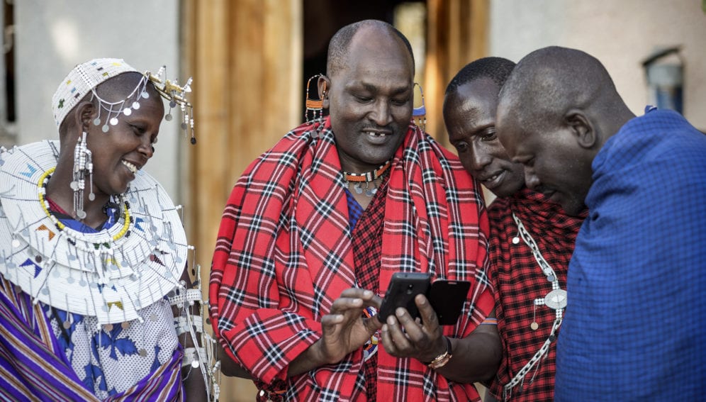 Indigenous man with smartphone