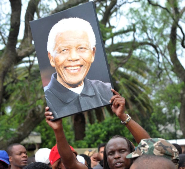 South Africans mourn the death of the late former President Nelson Mandela, 7 Dec 2013