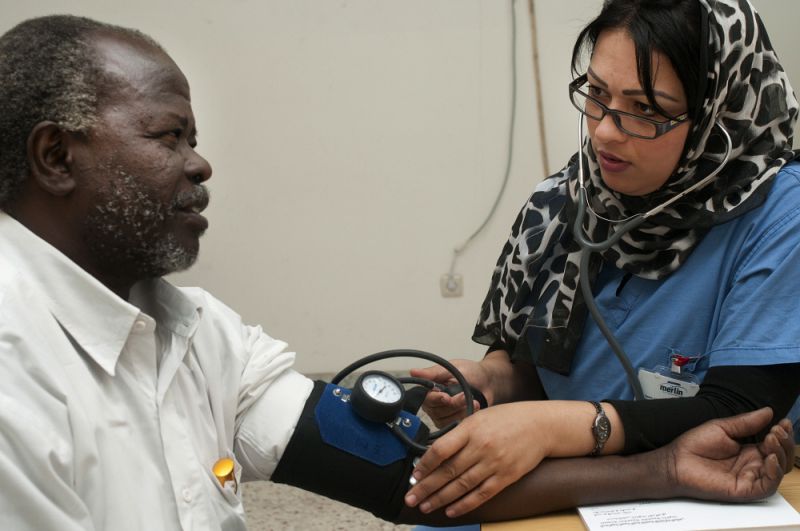 Tunisian doctor takes the blood pressure
