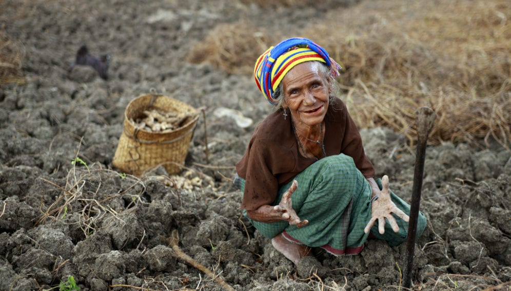 Woman in Field_Flickr_UN Photo_Martine Perret