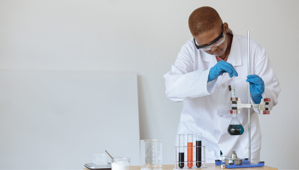 Teenage student conducting research in chemical laboratory. Research council supports South Africa’s young researchers.