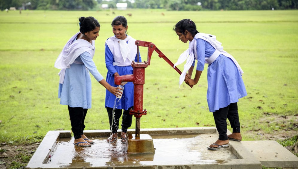 students getting water