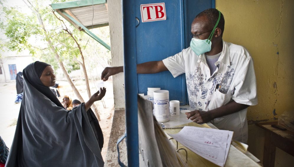 An outpatient collects her TB medicine from Galcayo hospital's dispensery