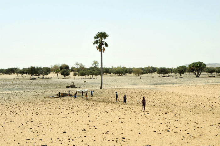 Children at a well used by migrating pastoralists