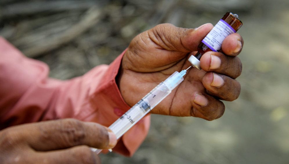 Health care prepares a measles vaccine