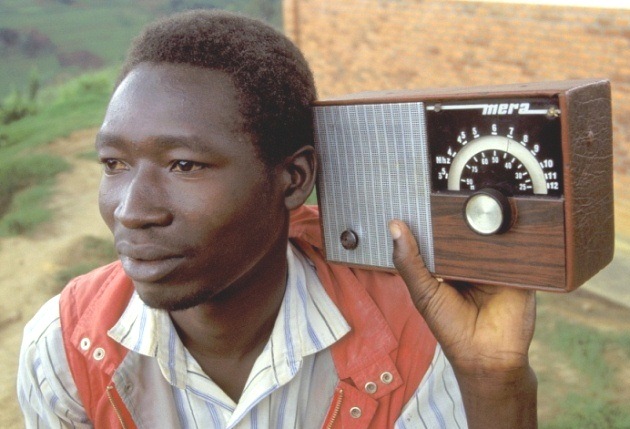 man listening to radio