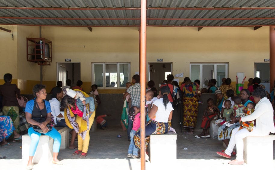 People waiting to be seen outside the Ndlavela  health centre in Matola. There are only two general hospitals in Maputo. According to the WHO, just 971 doctors were registered in Mozambique in 2012 
