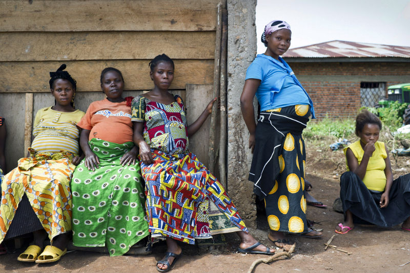 Pregnant woman wait to be seen at a rural antenatal clinic