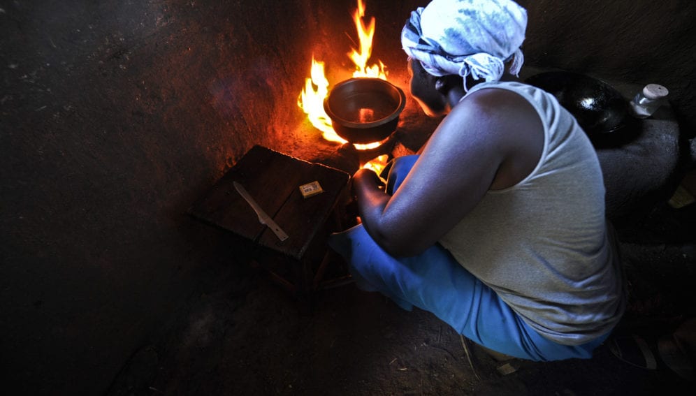 Woman cooking in her kitchen