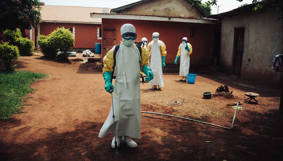 Decontamination teams at the home of a person who tested positive for the Bundibugyo virus in July 2026 in Bunia, DRC. More than 3,000 people have died in the outbreak, which is growing faster than any other.