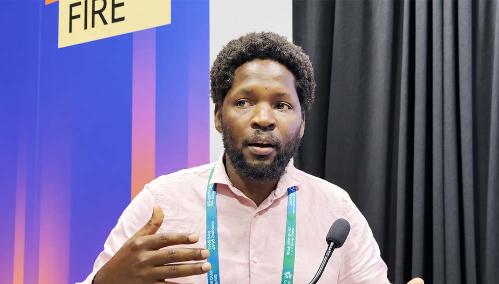 Johnblack Kabukye, a medical doctor and informatician at the Uganda Cancer Institute, speaks at the 2026 World Cancer Congress in Hong Kong.