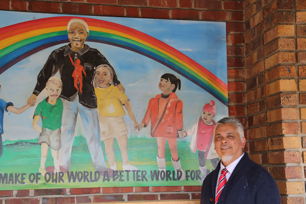 A mural of Nelson Mandela on the school walls. Kannemeyer imbues with hope Mandela’s famous words: “Education is the most powerful tool which you can use to change the world”  
