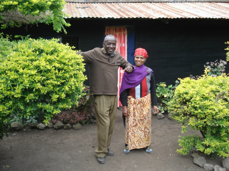 Jonas and Mary Somi outside their house in Nkoasenga, northern Tanzania. The Somis have lived on the slopes of Mount Meru all their lives, and have seen first-hand how climate change and deforestation have made it harder to grow crops in the once-fertile soil
