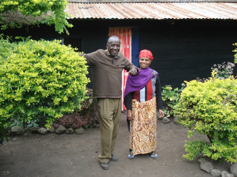 Jonas and Mary Somi outside their house in Nkoasenga, northern Tanzania. The Somis have lived on the slopes of Mount Meru all their lives, and have seen first-hand how climate change and deforestation have made it harder to grow crops in the once-fertile soil