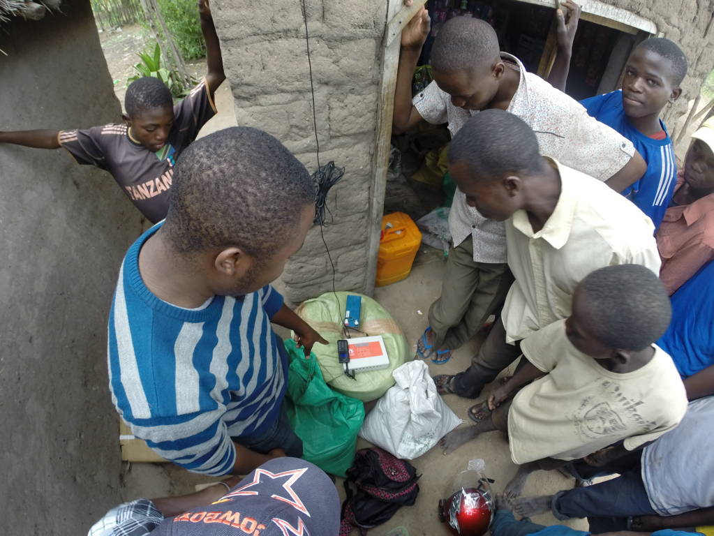 A demonstration in a village in Mwanza region. According to Eternum Energy field surveys, around 90 per cent of people who pay to charge their phones use them to support business activities such as those selling farm produce or trading goods
