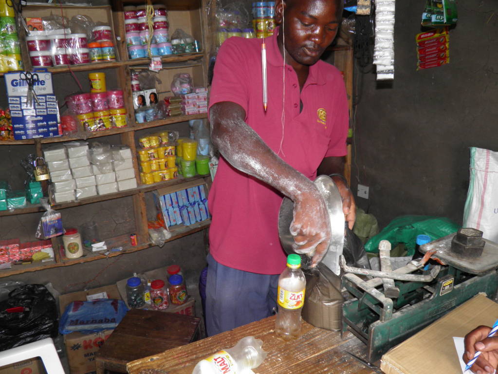 Masunga Ndongo runs a small grocery shop in Nyahiti, a village in Mwanza region. The shop makes US$4 a day before costs, which include buying kerosene for lighting. By renting a Solaris device for US$4 a week,  daily turnover is increased by half and saves money previously spent on kerosene by switching to rechargeable electric lighting
