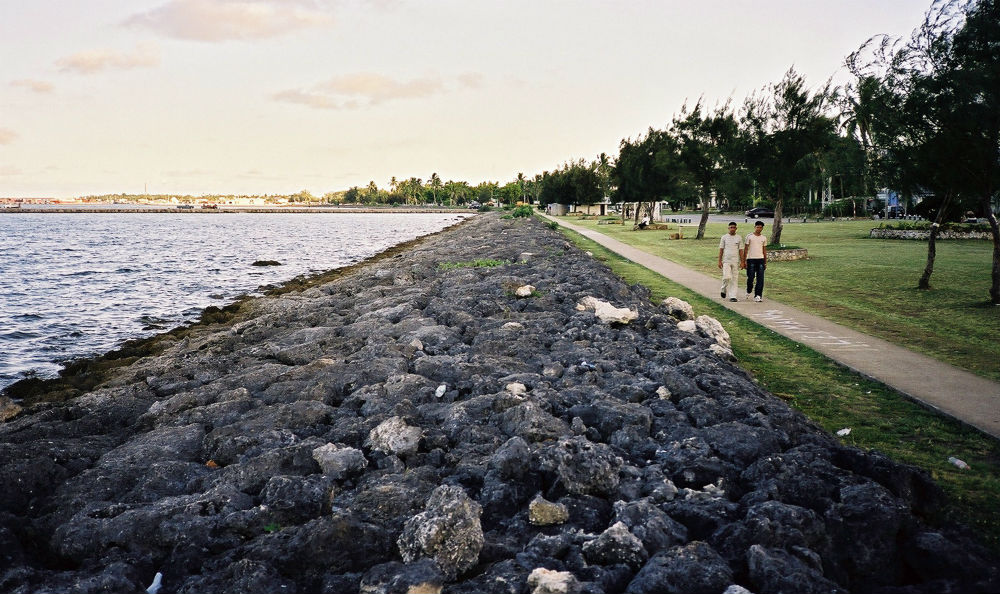 A coral wall in front of Tonga's low-lying capital Nuku'alofa. The wall provides recreational space and alleviates erosion. But how long will it last under rising seas?

