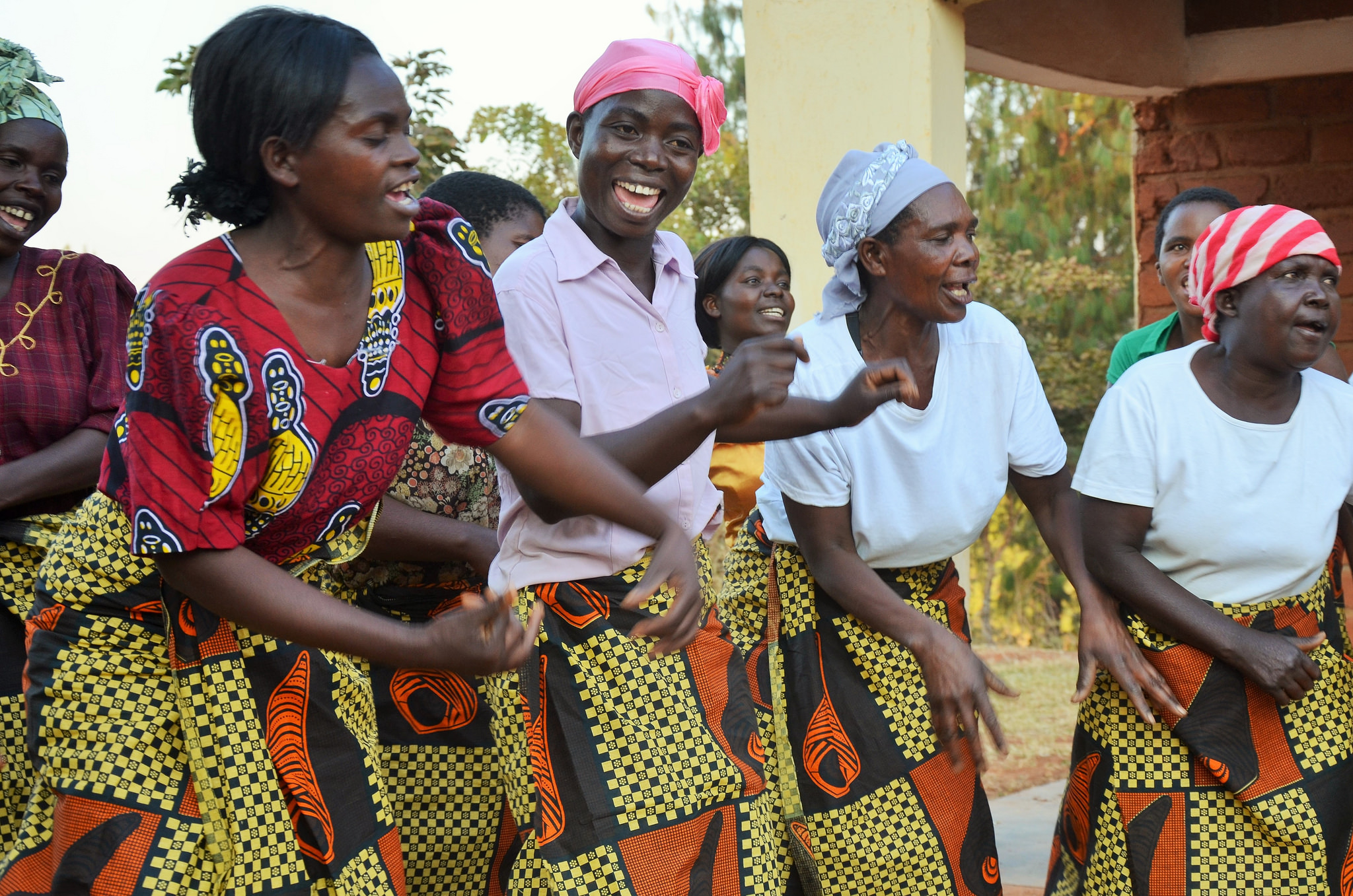 Women dancing in Njati in central Malawi. A good way to spread best practice in villages is through song and dance. Communities are taught about the dangers of the aflatoxin and which farming techniques can prevent mould
