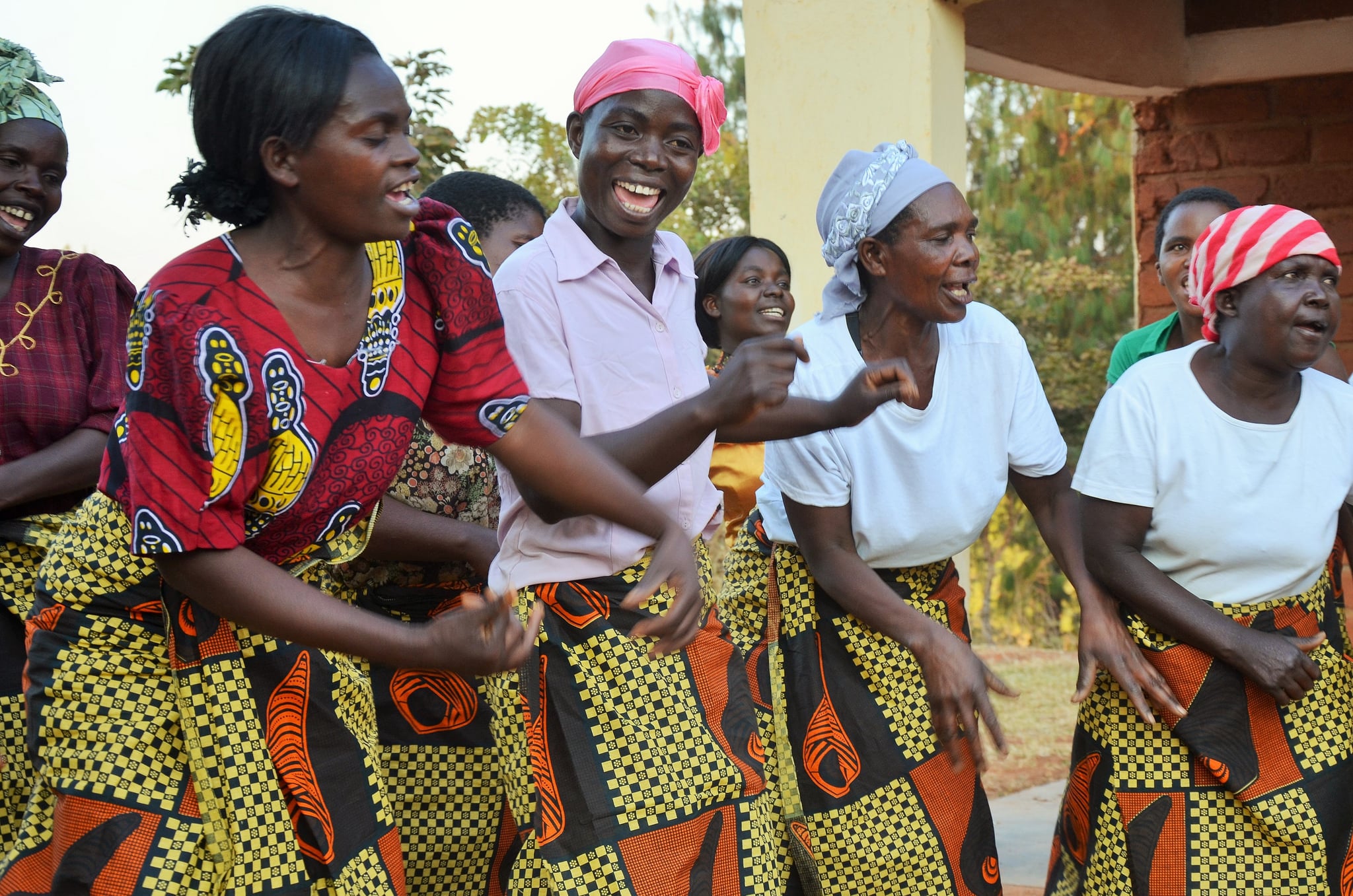 Women dancing in Njati in central Malawi. A good way to spread best practice in villages is through song and dance. Communities are taught about the dangers of the aflatoxin and which farming techniques can prevent mould
