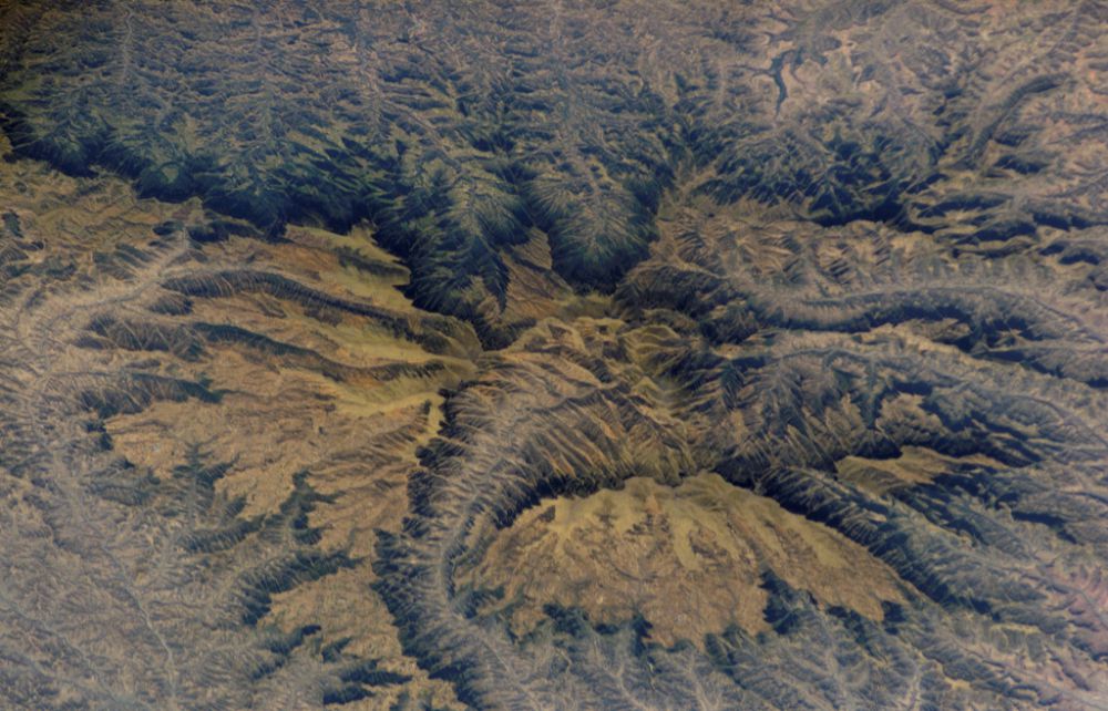 Africa is a continent of dramatic terrain – high mountains, massive river networks and deserts. There is no continuous road network linking East and West Africa, and the continent is ill-served by trains: mountainous terrain makes building railways unfeasibly expensive. This aerial shot of a mountain range in Ethiopia is one such case. 
