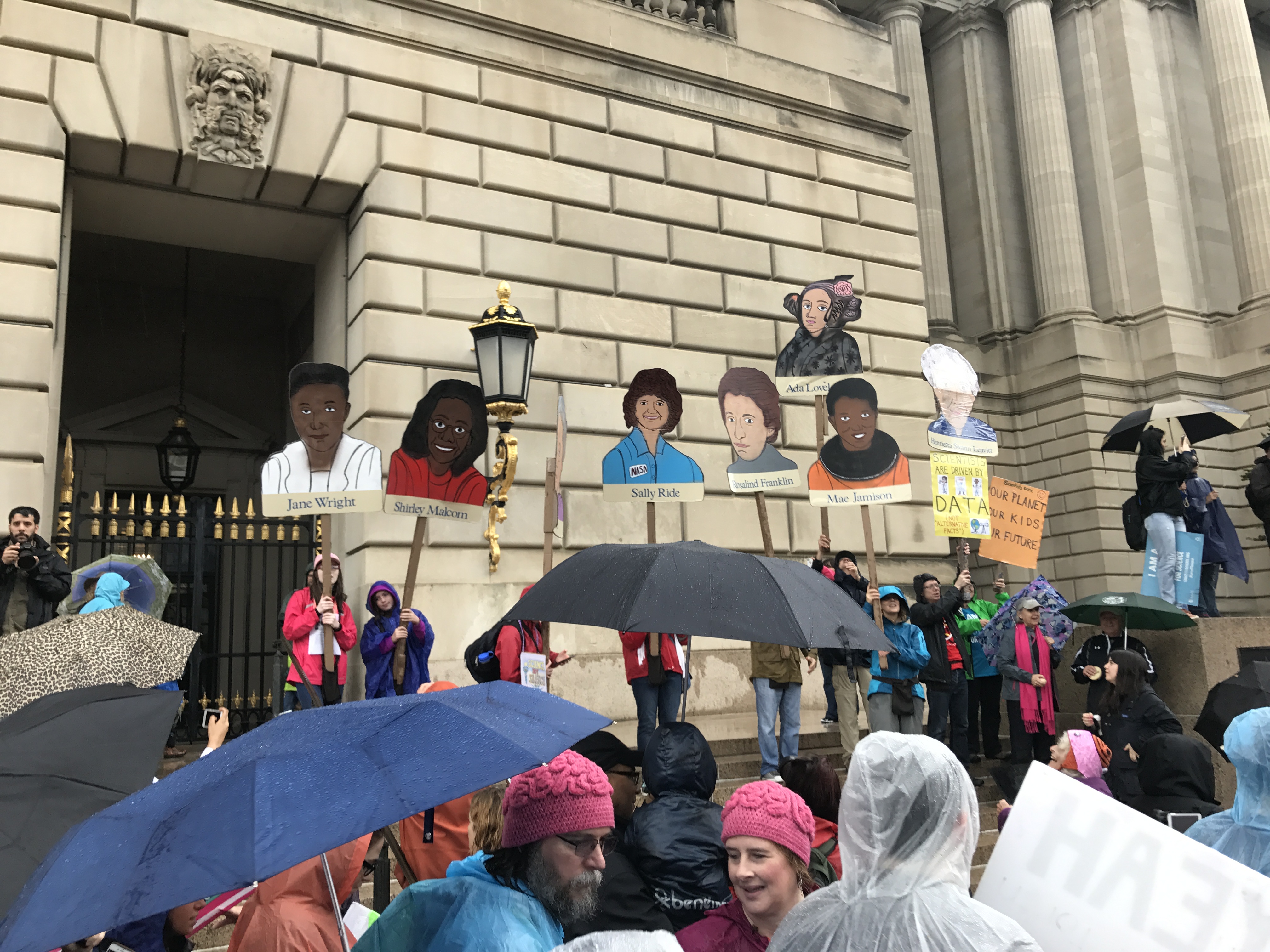 United States: An estimated 40,000 people marched in the capital city of Washington, DC. Here participants hold placards highlighting the importance of women in science.  
