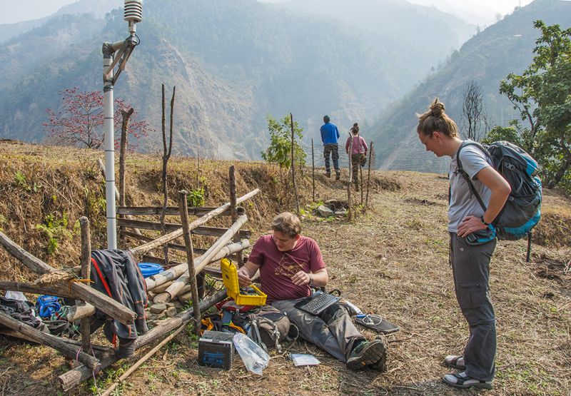 The scientists check a wireless seismometer and weather station near Chaku. Such deployments aim to track changes in ground properties and their responses to earthquake aftershocks and rainfall
