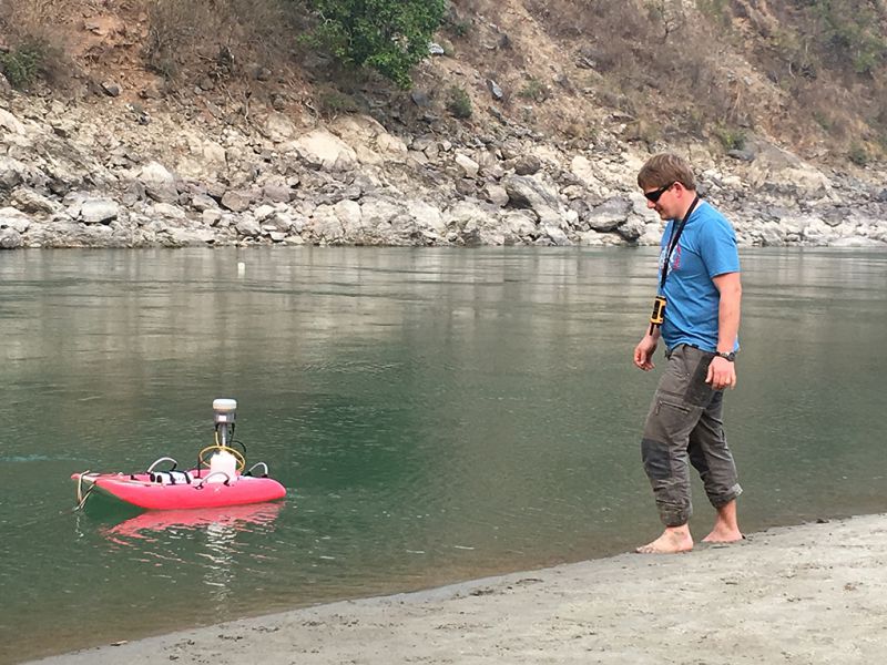 Christoff Andermann, a geologist at the GFZ German Research Centre for Geosciences, monitors river flow and sediment transport near Khurkot in central Nepal. Such studies help to estimate the movement of debris and groundwater from hillsides to rivers

