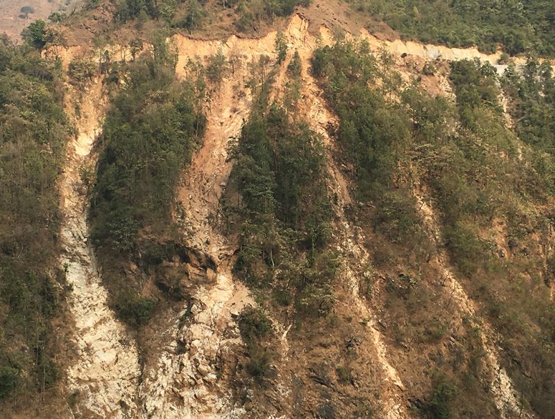 Landslide scars run down from a poorly built road near Mirmee in central Nepal like frozen waterfalls. The proliferation of road construction without proper slope stabilisation has contributed to the rise in landslides in recent years
