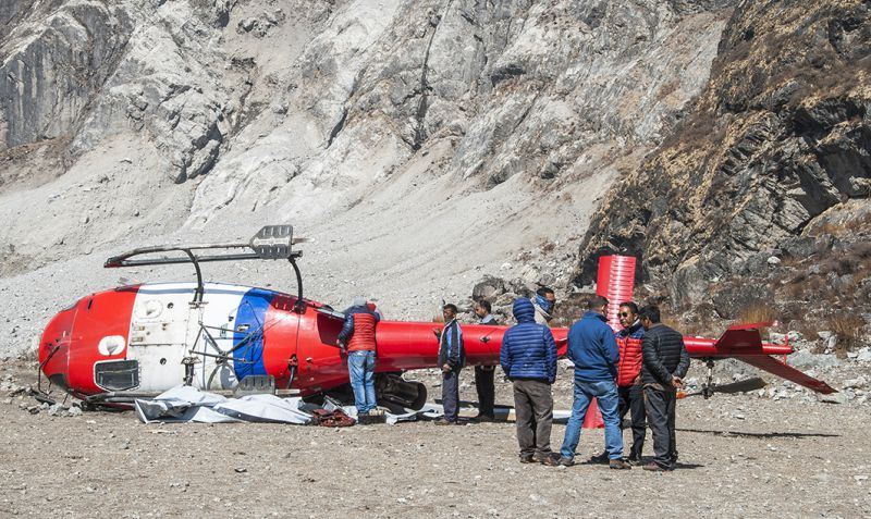A helicopter, sponsored by NGOs to transport construction materials to Langtang villages, toppled over on the landslide debris. It was the only chopper in Nepal that could carry heavy loads and navigate complex terrain
