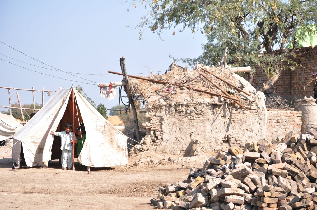 What happens without shelter recovery programmes after flooding. These people have been living in tents for over two years after the 2010 floods in the city of Jacobabad, in northern Sindh province.&nbsp;They lack the resources to rebuild. One community did rebuild mud houses, but they collapsed in a subsequent flood
