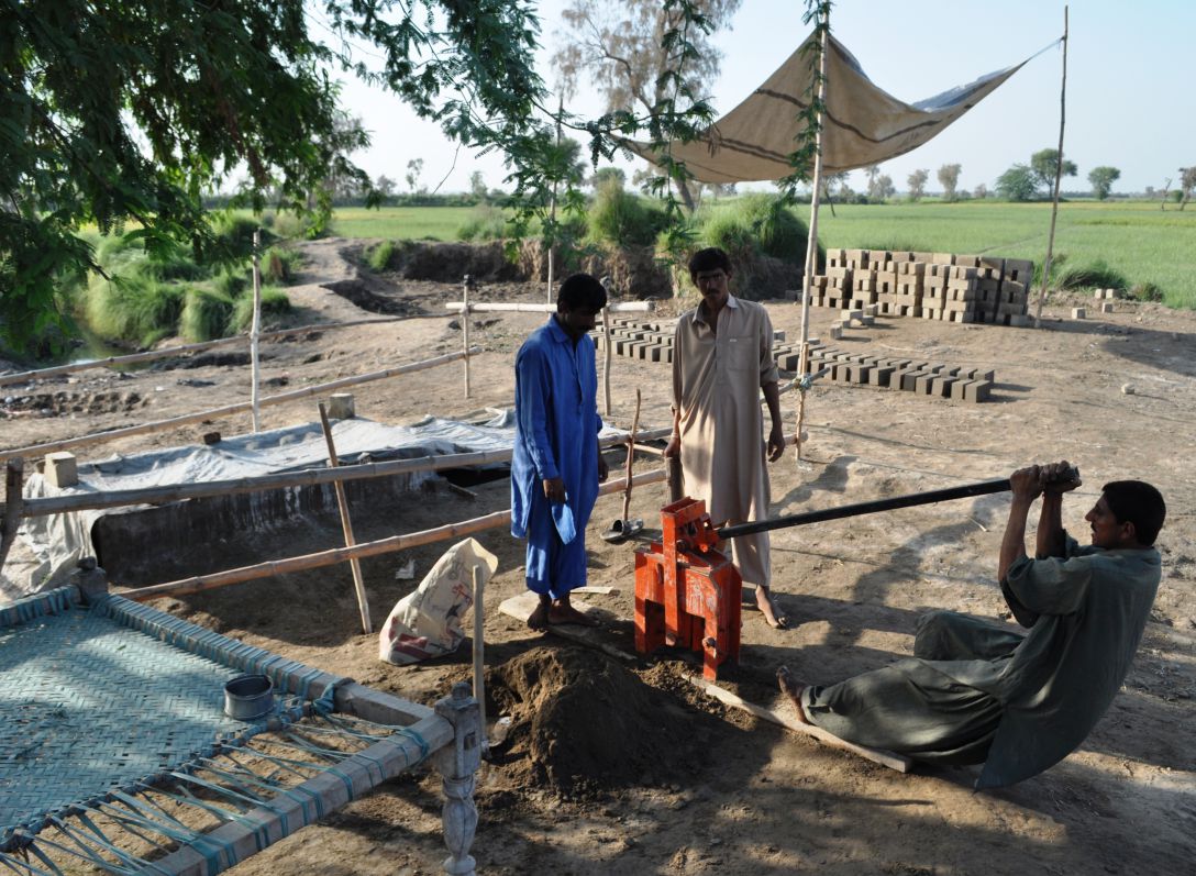 A simple, locally fabricated brickmaking machine used in a project in northern Sindh province managed by HANDS. Costing around US$200, the machine compresses soil and lime to make strong, dense blocks
