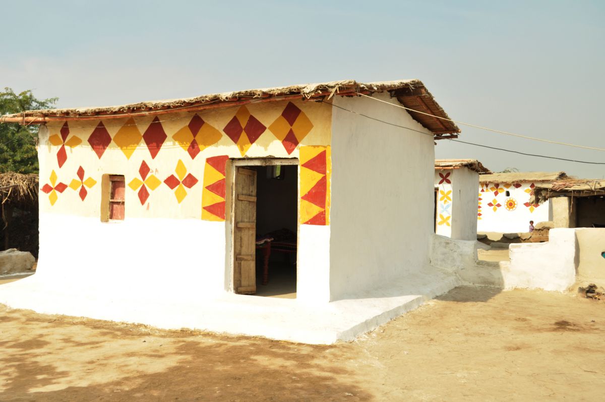 Finished homes built from cured (hardened) earth-lime blocks. Families did the painting themselves​, without being asked, showing pride in their work
