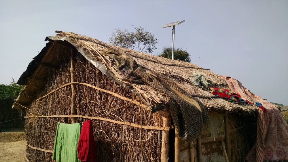 Single-home solar lighting systems such as this provide enough power to light homes at night and charge mobile phones
