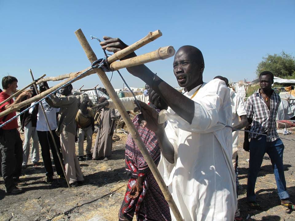 A Sudanese man putting up a shelter in a camp for internally displaced people. With record numbers of people displaced across the world, the call for shelters that are more dignified and healthier, as well as cheaper and resource-efficient, has never been more urgent
