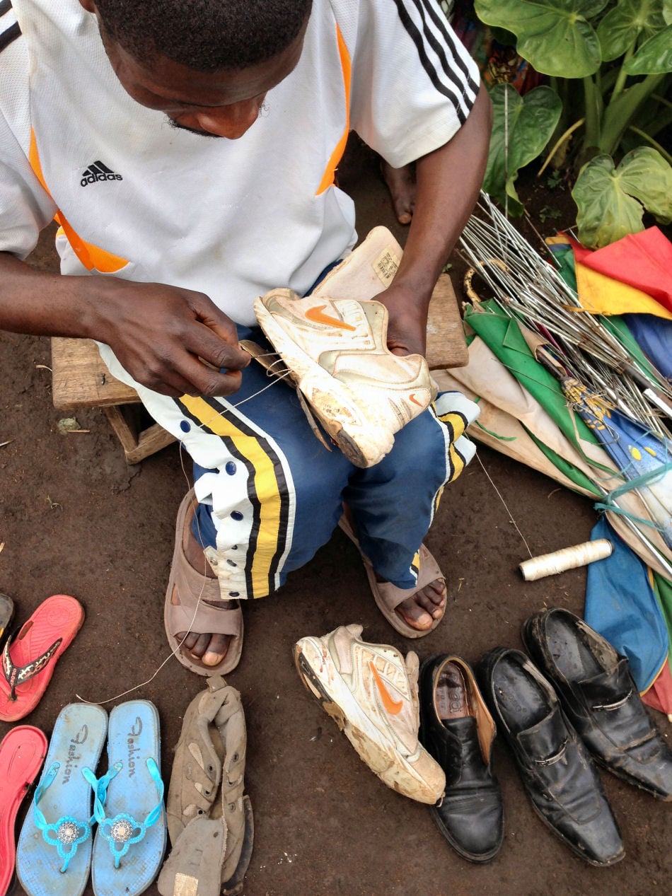 A Congolese refugee repairman in Kyangwali refugee settlement.