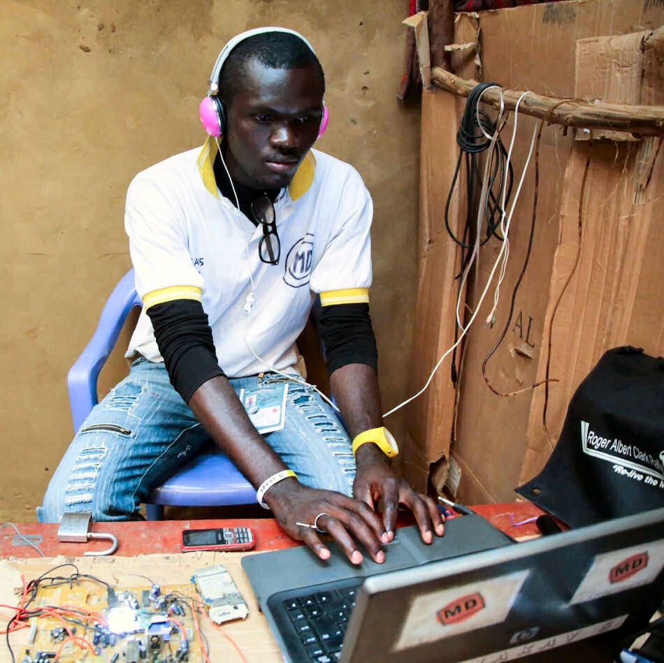 Demou-Kay, a Congolese refugee, running his radio station in Nakivale settlement. It is the only station in Nakivale, and is staffed by a team of young refugees, alongside Demou-Kay.