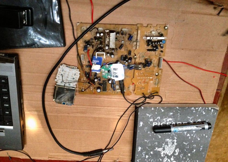 Demou-Kay built this radio transmitter from second-hand electrical parts and a mobile phone.
