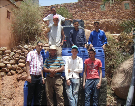 Water barrels in Talat Merghen